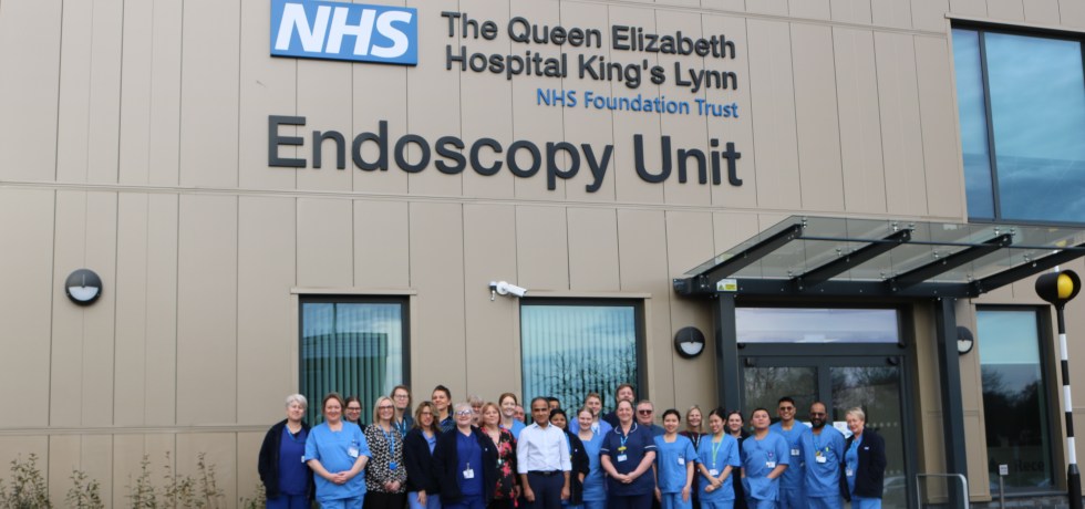 Clinical team standing outside QEH Endoscopy Unit.