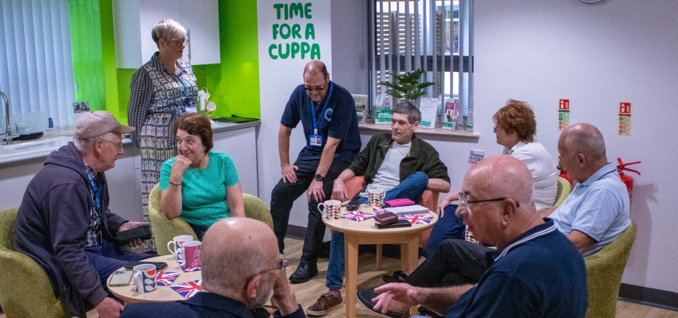 People have coffee and cake at QEH's new cancer support group for Armed Forces