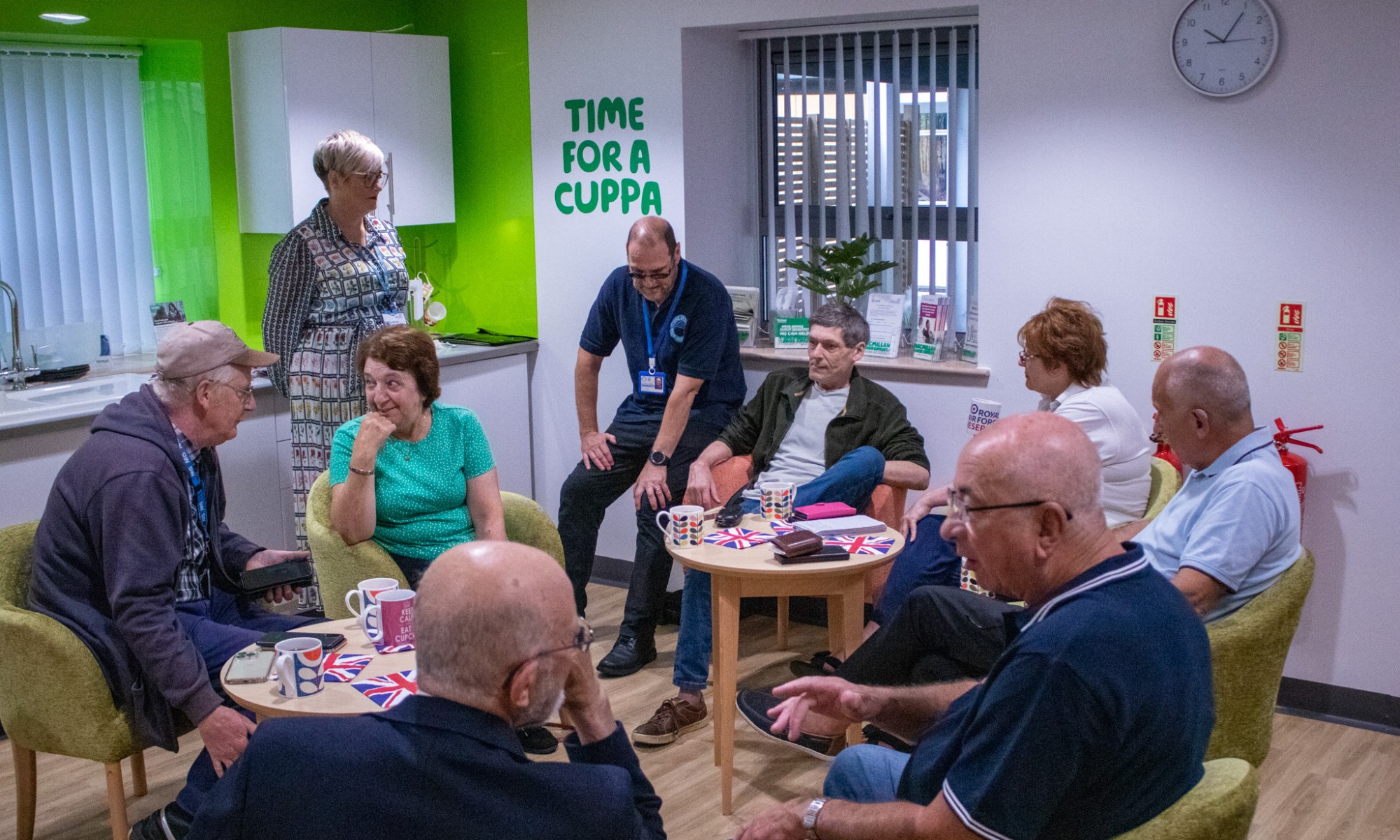 People have coffee and cake at QEH's new cancer support group for Armed Forces