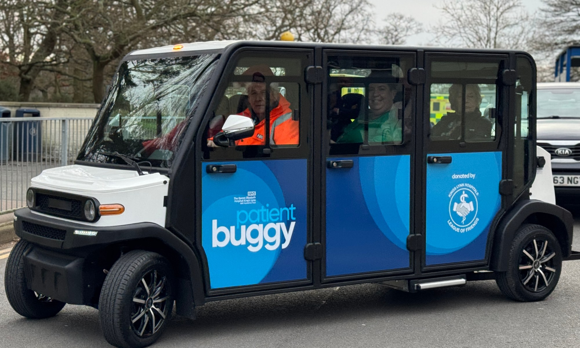 Patient buggy transporting people.