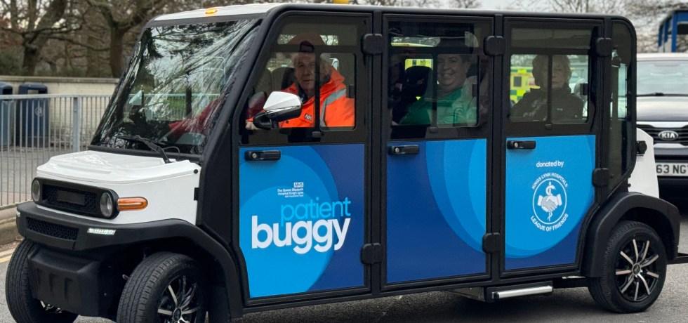 Patient buggy transporting people.