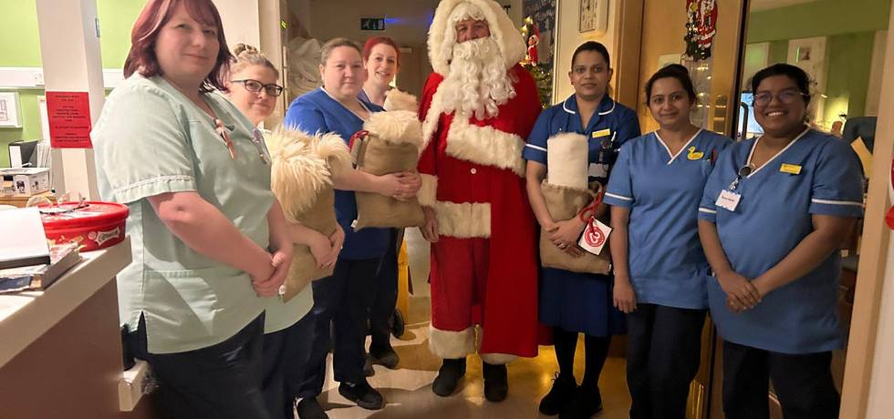 Members of The QEH receive gifts from Norfolk Blood Bikes