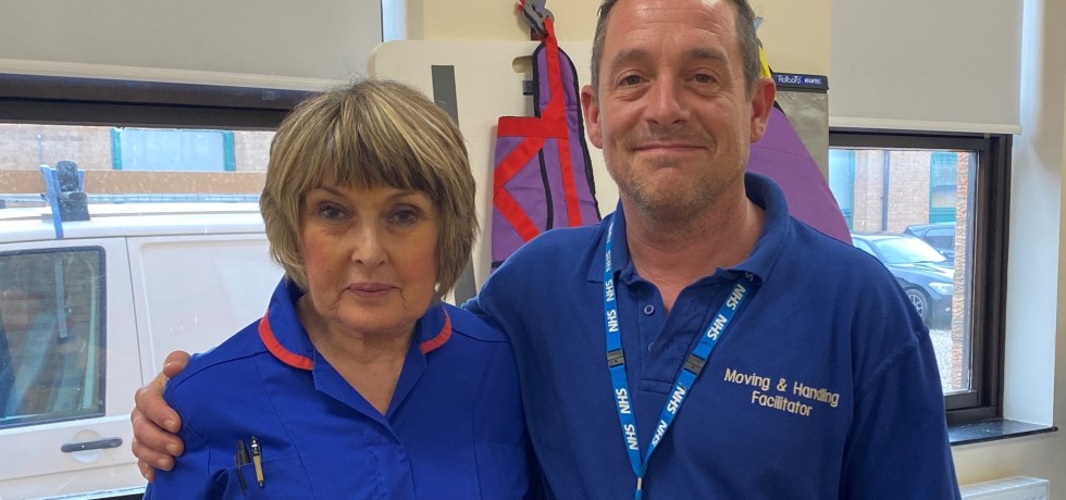 Corinne and Mark standing side-by-side