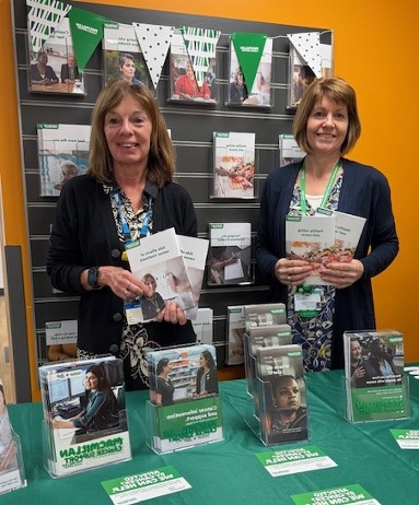 Jane and Caroline holding leaflets