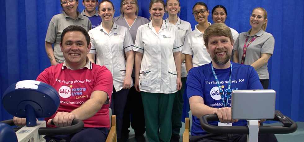 Scott Ablett and John Syson on specialised exercise bicycles with physiotherapists in the background