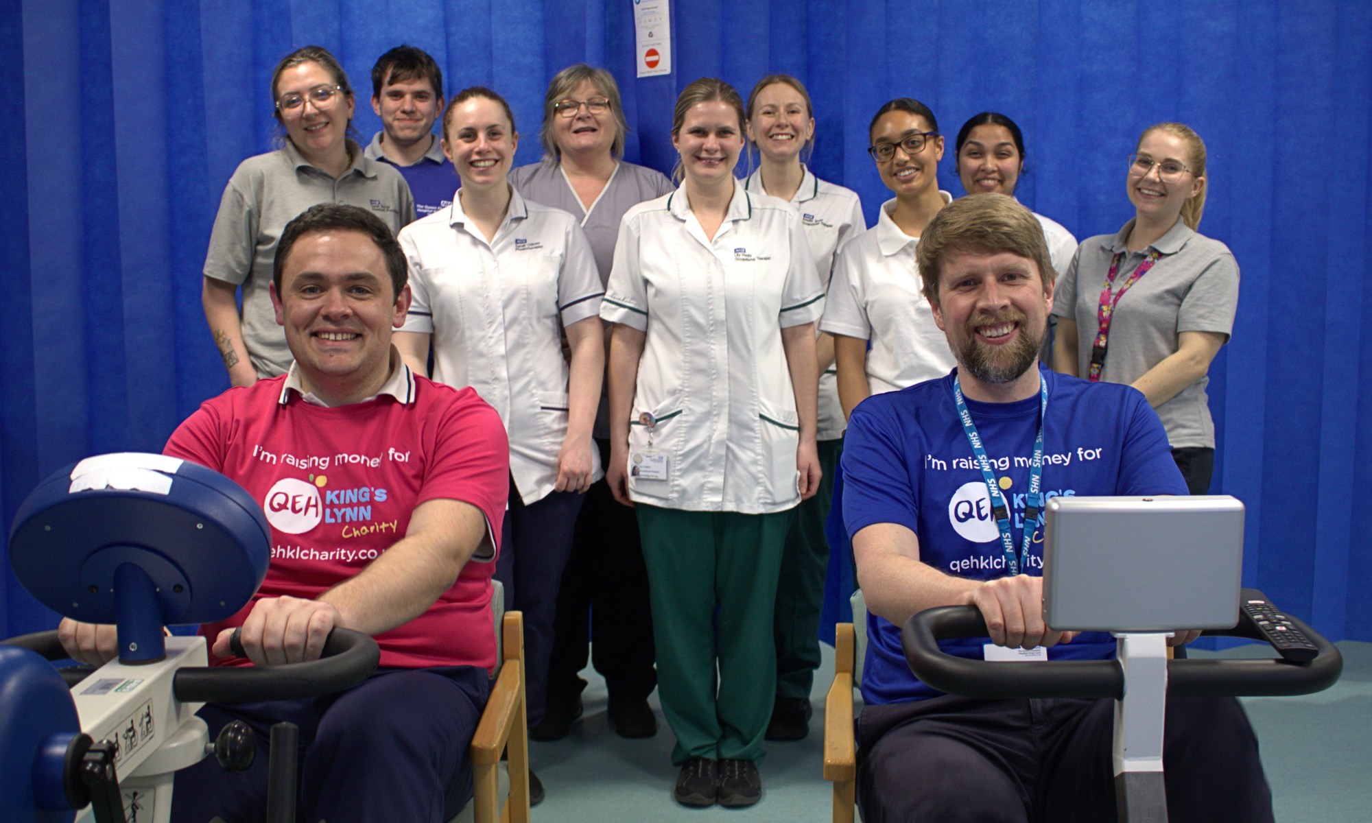 Scott Ablett and John Syson on specialised exercise bicycles with physiotherapists in the background