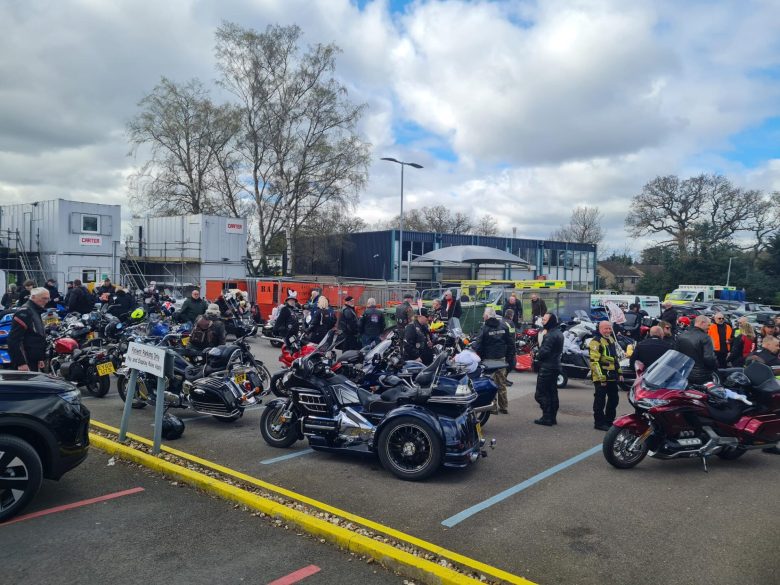 a group of bikers and their motorcycles