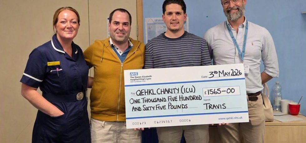A photo of a nurse (Emma Hampton), Sergio Figueiredo, Travis Toll and Dr Phillip Hassle holding up a giant novelty cheque worth £1,565 for The QEH's Intensive Care Unit